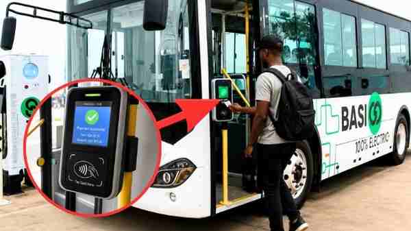 Kenya’s Electric Bus Revolution Is Gaining Speed, But the Infrastructure Question Remains Passenger Boards Electric BRT Bus Using Smart Card Validator