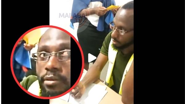 Uganda immigration officials inside their office during a confrontation with a Kenyan traveler over a yellow fever vaccination certificate at a border crossing.