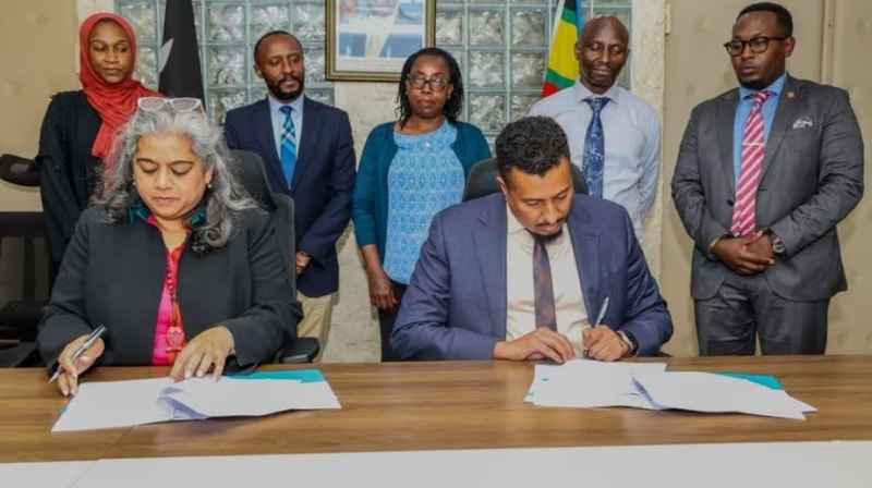 Kenya and IFC Representatives Sign E-Mobility Cooperation Agreement Kenya and IFC representatives signing a cooperation agreement on Kenya’s e-mobility plans